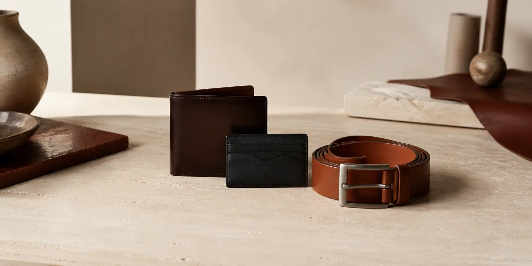 Wolfoco leather wallets and cardholder in a quiet luxury studio